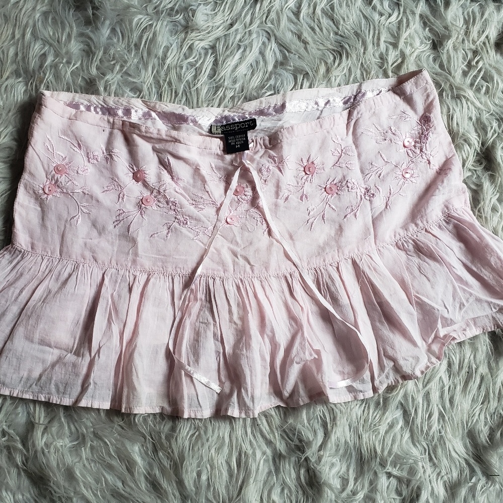 Passport Embroidered Front Tie Mini Skirt